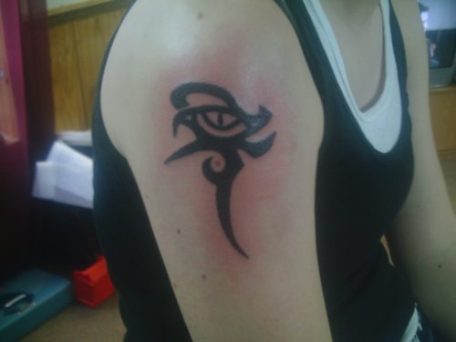 Black Ink Tribal Horus Eye Tattoo On Right Shoulder